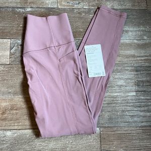 NWT Athleta 7/8 salutation stash tights